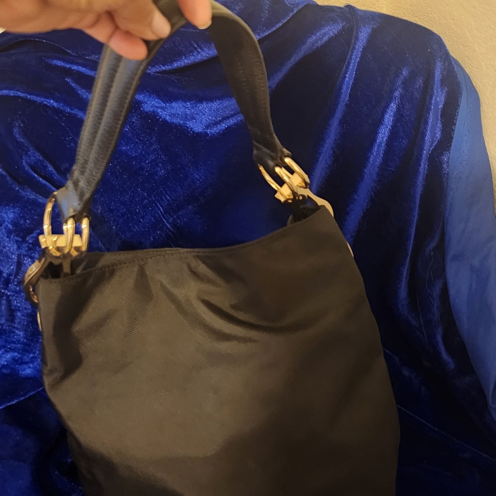 Elegant Black Shoulder Bag with Gold Details